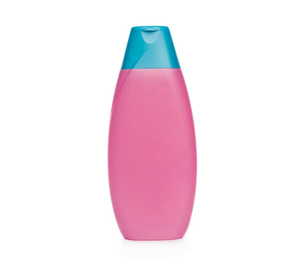 istock Pink bottle for body care product 1551713249