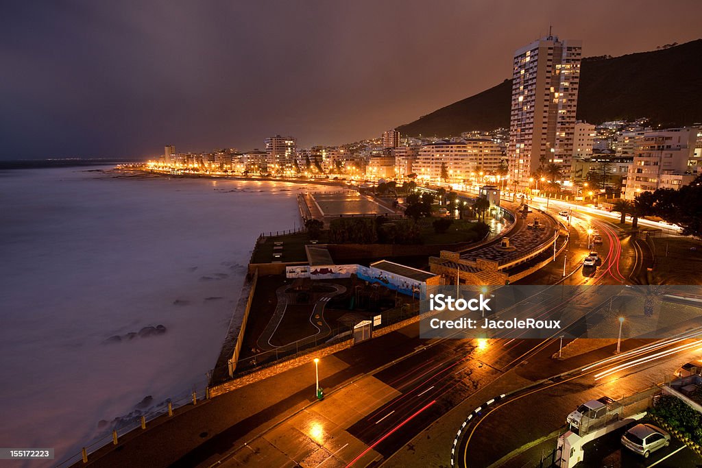 Sea Point at night South Africa Sea Point at night South Africa.  Buildings, apartments residential lights and traffic trails of cars in foreground.   Cape Town Stock Photo