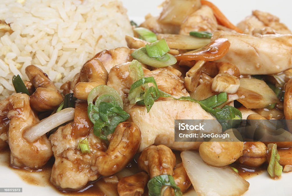 Chinese Chicken with Cashew Nuts Chinese takeaway of chicken with cashew nuts and egg fried rice Cashew Stock Photo