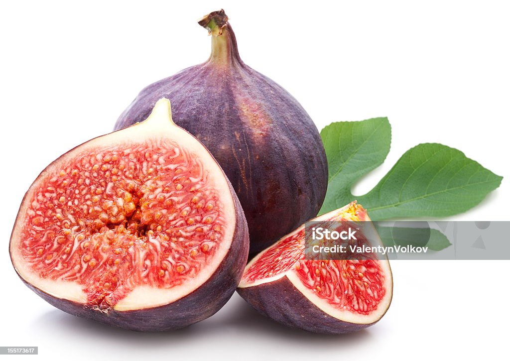 Figs with leaves. Figs with leaves on a white background. Fig Stock Photo