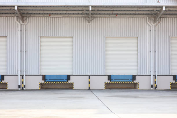 istock warehouse load dock closing effect from covid-19 lockdown, logistic and industrial concept 1551759897
