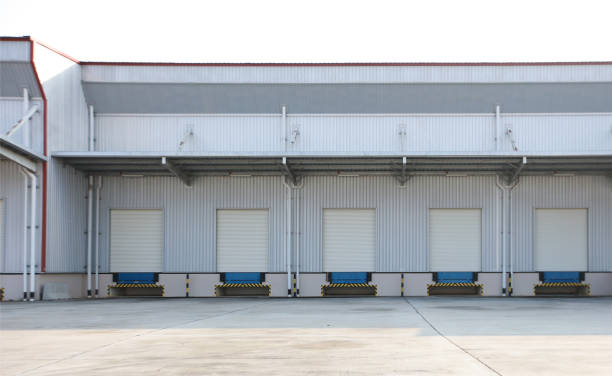 istock warehouse load dock closing effect from covid-19 lockdown, logistic and industrial concept 1551759898
