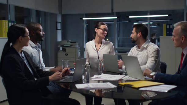 istock Multiethnic business people having board meeting in conference room 1551765254
