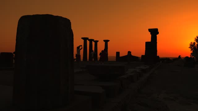 The temple of Athena in the ancient city of Assos at sunset.
