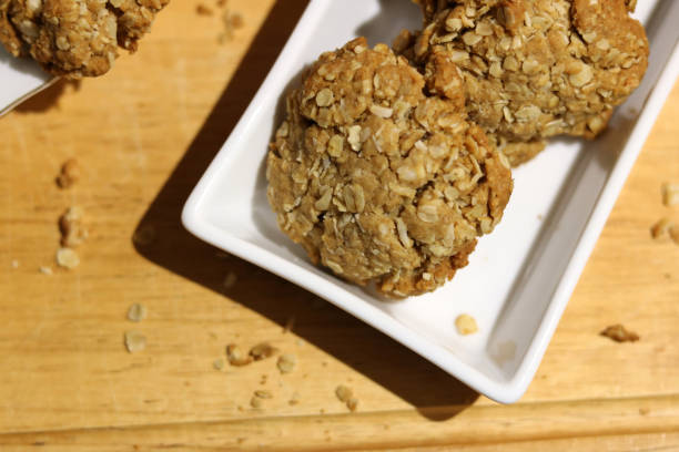 istock Photo of Anzac Biscuits with a hot Beverage. 1551905614