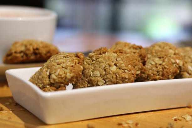 istock Photo of Anzac Biscuits with a hot Beverage. 1551906198