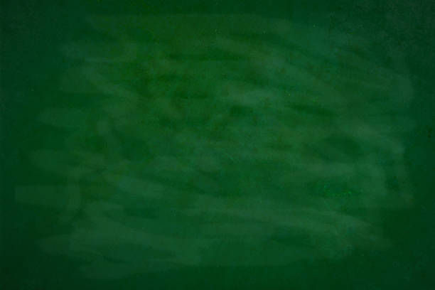 istock Green Chalkboard texture for school display backdrop. chalk traces erased with copy space for add text or graphic design grunge background. Green board. Dark green wall backdrop. Education concepts. 1551926078