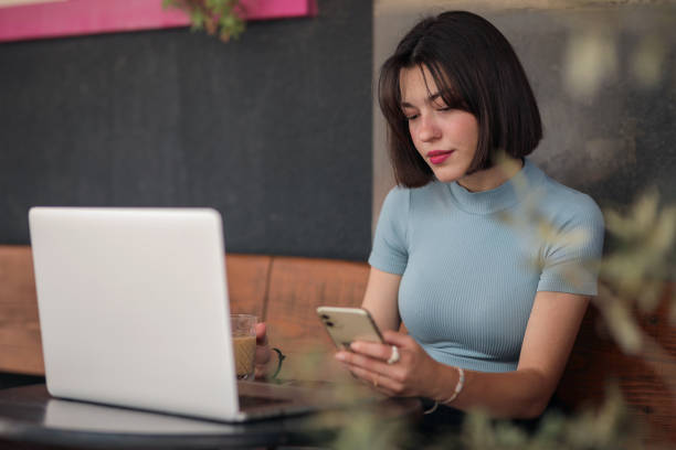 istock Young Generation Using Social Media, Millennial Generation , Freelance Young Businesswoman 1551957253