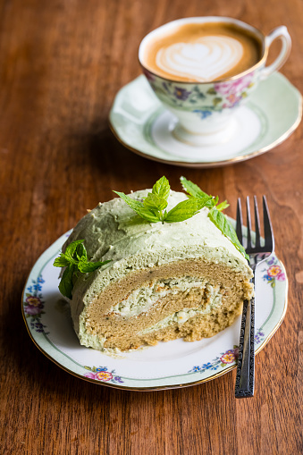 Vintage style tea table setup with vintage English bone china tableware