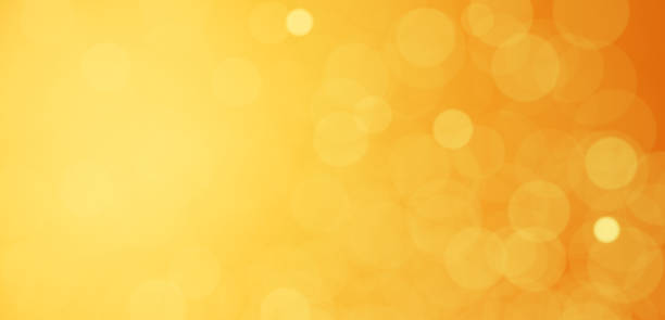istock 3D Illustration.Light on orange background. Blurred light. Ball blur. (Horizontal) 1552042100