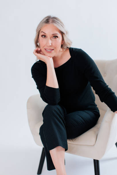 istock White blonde professional woman in black 1552144059