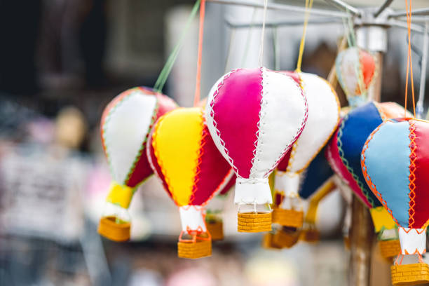 Traditional festival ,rows of multicolored balloons,  street decorations forming a canopy, low angle close-up view. Vilalba, Galicia, Spain.