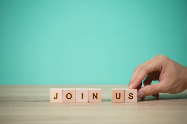 istock Job recruiting advertisement. represented by 'JOIN US' texts on the block. 1552169487