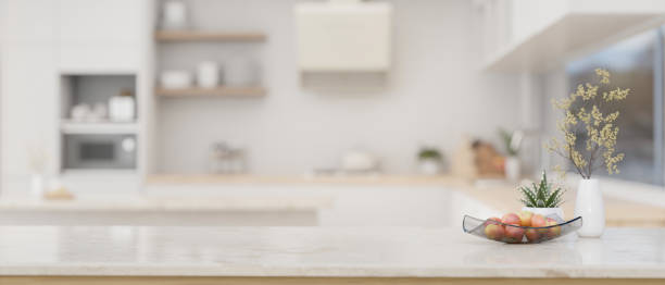 istock A copy space on a luxury white marble kitchen countertop in a modern white kitchen. 1552171106