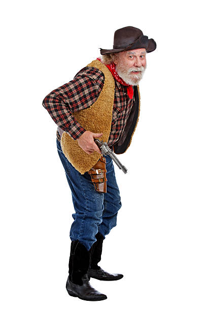 istock Cautious old cowboy ready with his gun 155219071