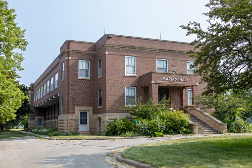 Mankato, Minnesota, USA - June 17, 2023: This image shows an exterior view of Marian Hall, on the campus of Our Lady of Good Counsel, established in 1912 by the School Sisters of Notre Dame.