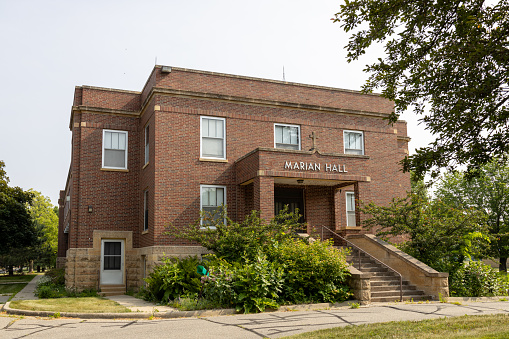 Mankato, Minnesota, USA - June 17, 2023: This image shows an exterior view of Marian Hall, on the campus of Our Lady of Good Counsel, established in 1912 by the School Sisters of Notre Dame.