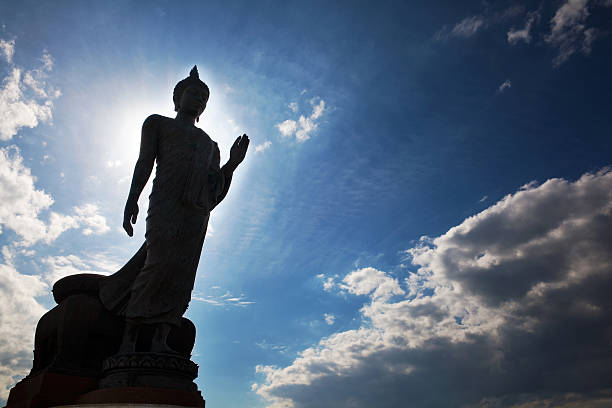 walking buddha bild, thailand - venerable stock-fotos und bilder