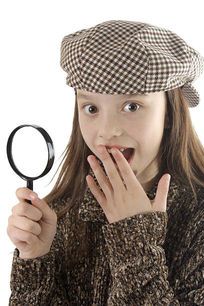 istock little girl playing detective 155224354