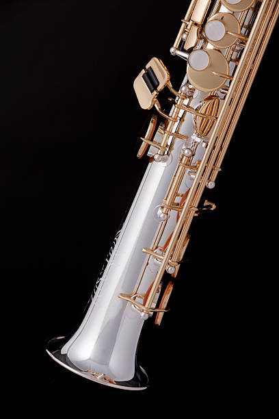 istock Saxophone Soprano Isolated On Black 155224512