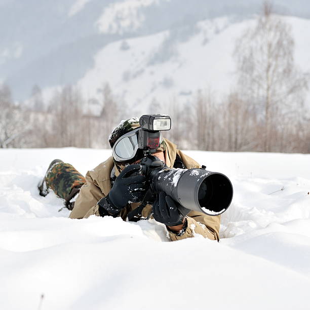 istock Professional photographer at work in winter 155225207