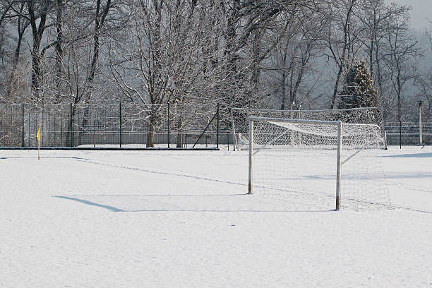 istock Soccer field under snow. 155225359