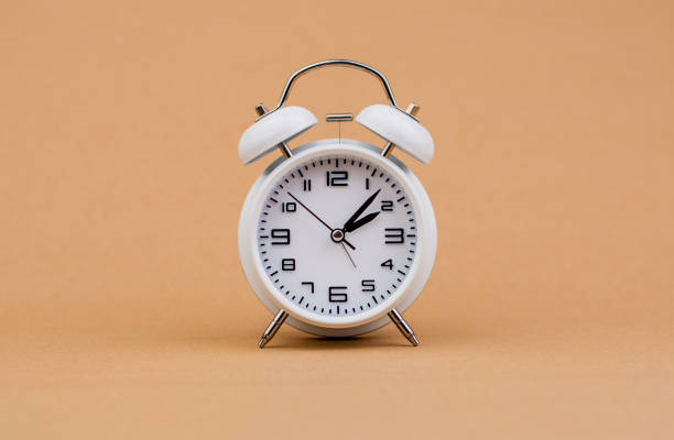 istock alarm clock telling time Reminder working with time business appointment schedule punctuality time concept 1552256460