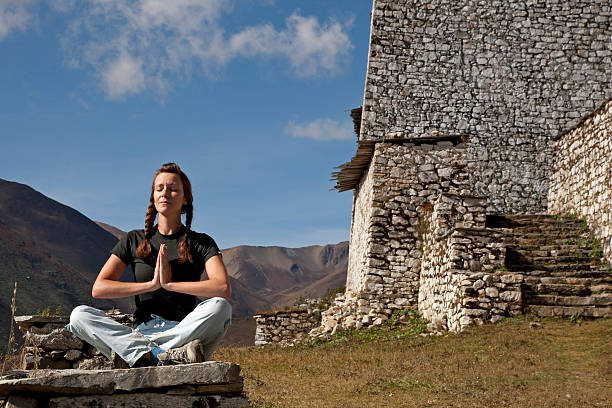 Woman meditating stock photo