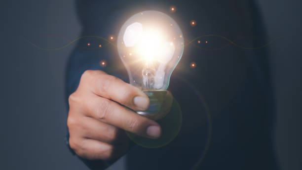 istock Businessman with light bulbs the new ideas and creative. 1552262785