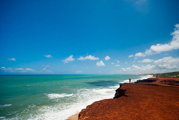 Cliffs and beach at Praia das Minas stock photo