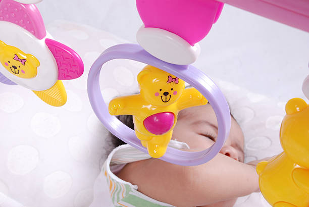 istock Baby plays with toys 155227284