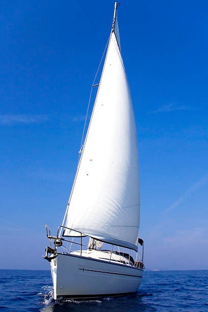 istock White boat sailing on the Adriatic Sea 155228288
