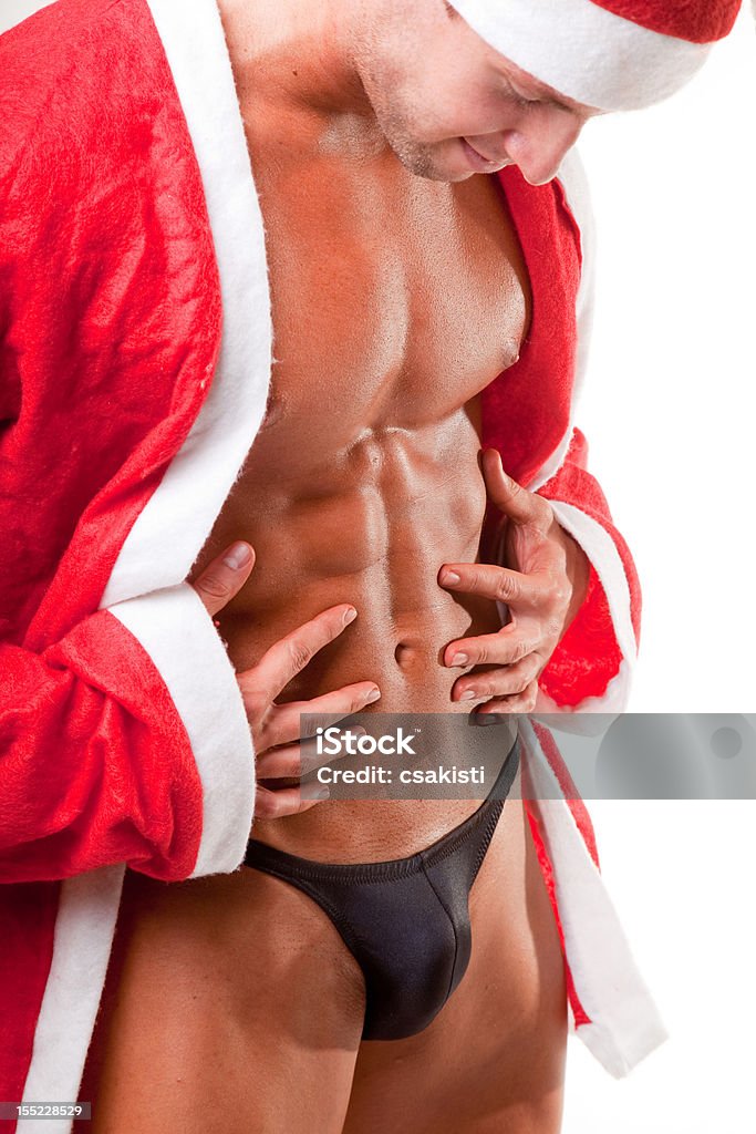 santa claus musculaire - Photo de 20-24 ans libre de droits