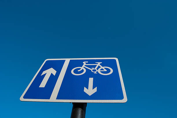 istock Cycling lane sign with blue sky 155229311