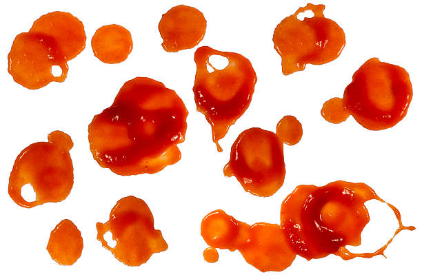 Ketchup blood stains Ketchup splashes or blood stains isolated on white background. savory sauce stock pictures, royalty-free photos & images