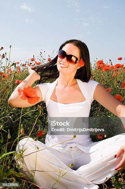 Young Beautiful Woman In Poppy Flowers Stock Photo - Download Image Now - Adult, Adults Only, Agricultural Field