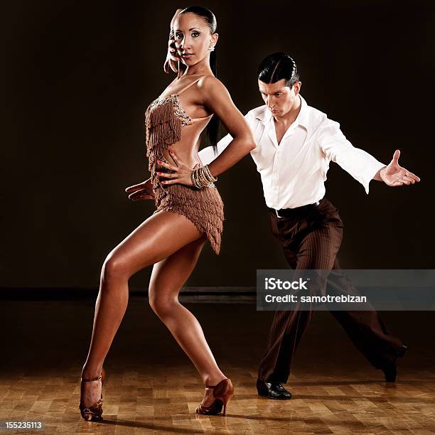 Professional Dancing Couple Performing In Ballroom Stock Photo - Download Image Now - Dancing, Salsa Dancing, Dancer