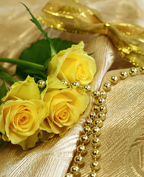 istock Bouquet of yellow roses with celebratory decor 155235569