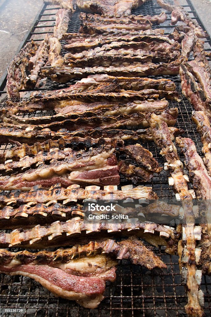 large barbecue very big barbecue taken in argentina, where barbecue is a traditional meal.vertical image. Argentina Stock Photo