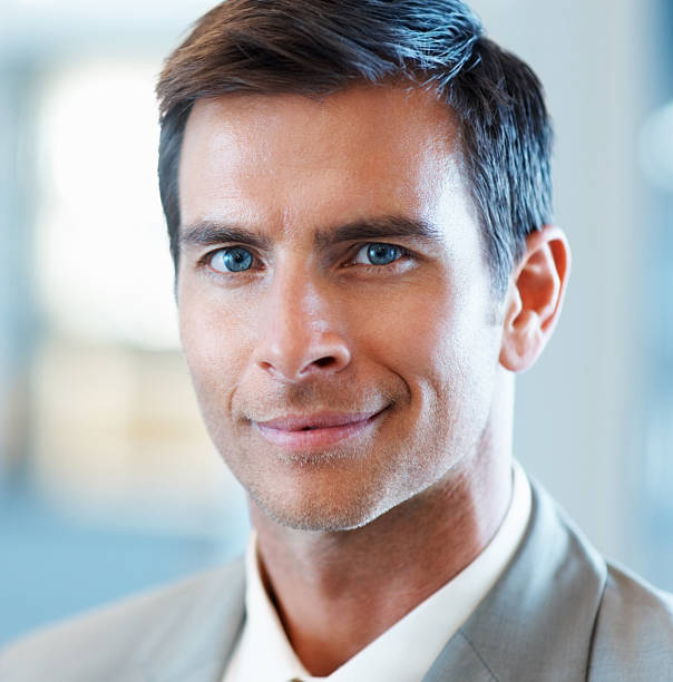 istock Handsome young business man smiling 155235835