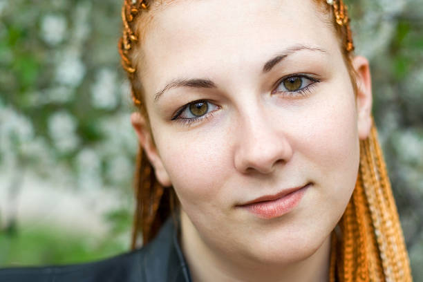 istock young beautiful serene woman with african braids 155235855