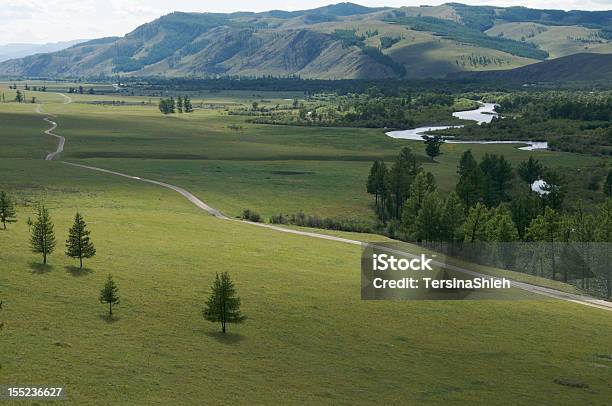 Jalman Meadows In Mongolia Stock Photo - Download Image Now - Dirt Road, Green Color, Hill