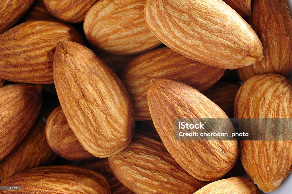 almond nut pile of almond nut. macro closed-up and top eye view Almond Stock Photo