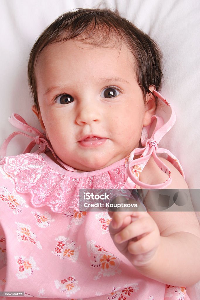Bébé en robe rose - Photo de 0-11 mois libre de droits