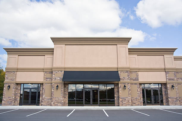 Retail Storefront Front view of newly constructed retail storefront. awning stock pictures, royalty-free photos & images