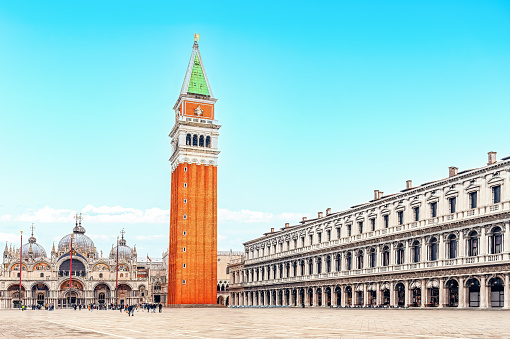 View of Saint Mark's Basilica and Campanile against sky at town square seen through archway in Venice,Italy