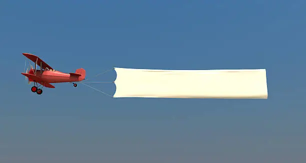 Airplane towing a banner