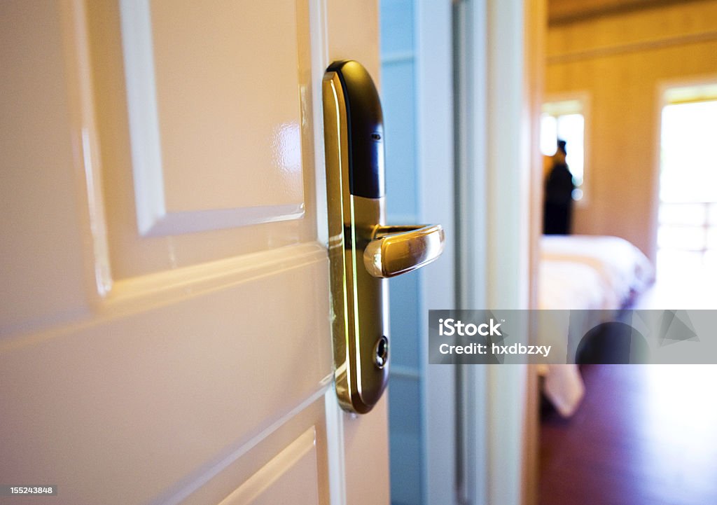 open door Open the door of hotel room. Ajar Stock Photo