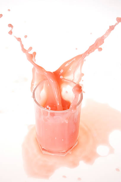 strawberry milk shake splash stock photo