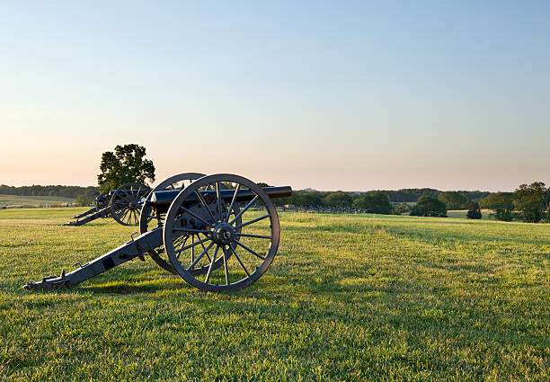 Cannons at Manassas Battlefield Sunset view of the old cannons in a line at Manassas Civil War battlefield where the Bull Run battle was fought. 2011 is the sesquicentennial of the battle 150th anniversary stock pictures, royalty-free photos & images